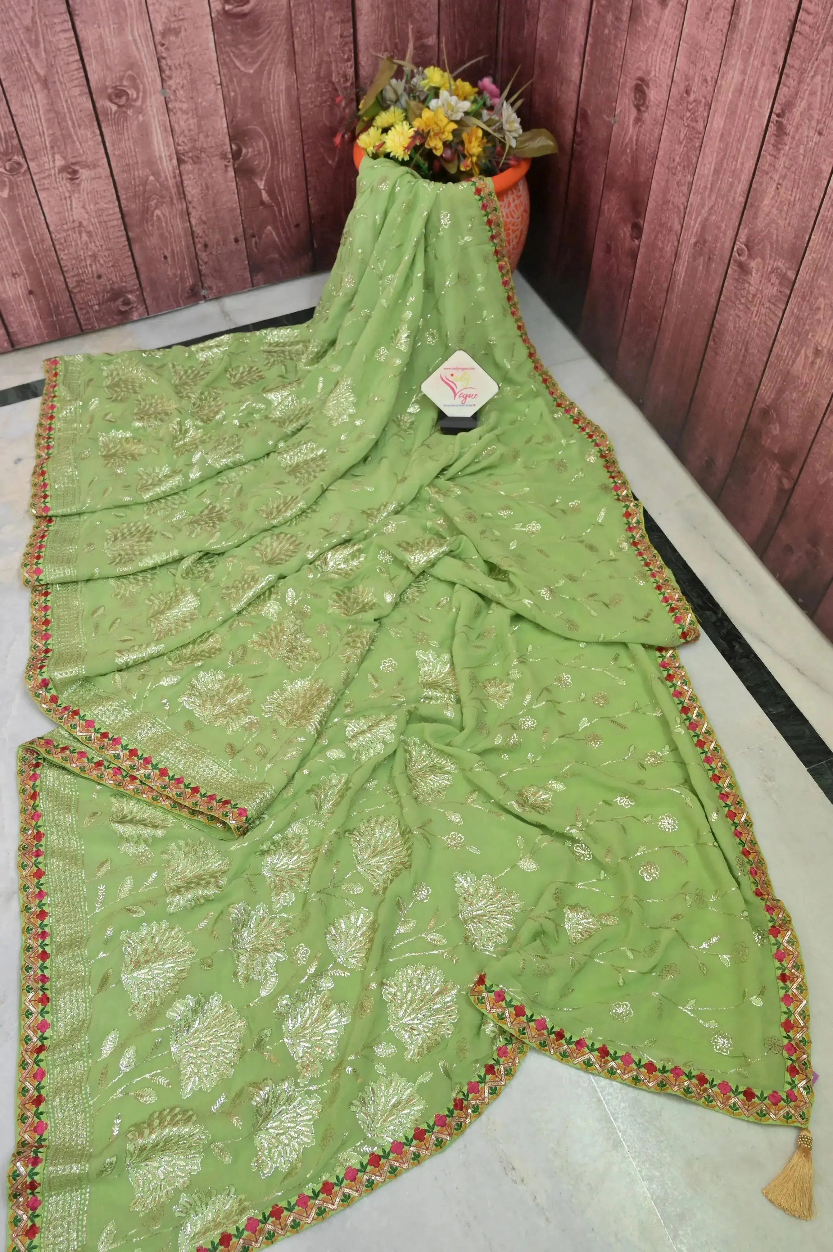 Light Green Pure Georgette Saree with Sequin Work Allover