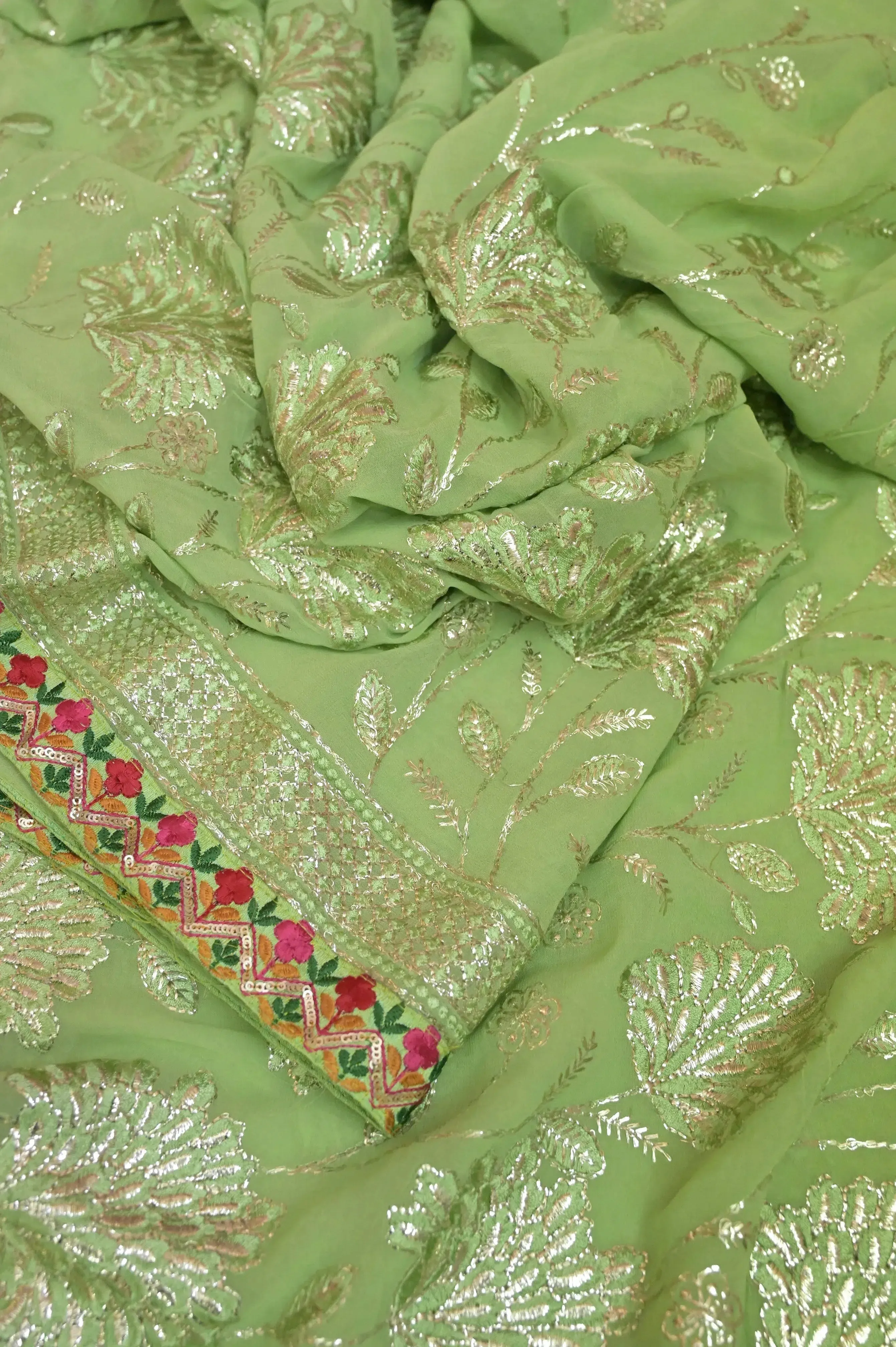 Light Green Pure Georgette Saree with Sequin Work Allover