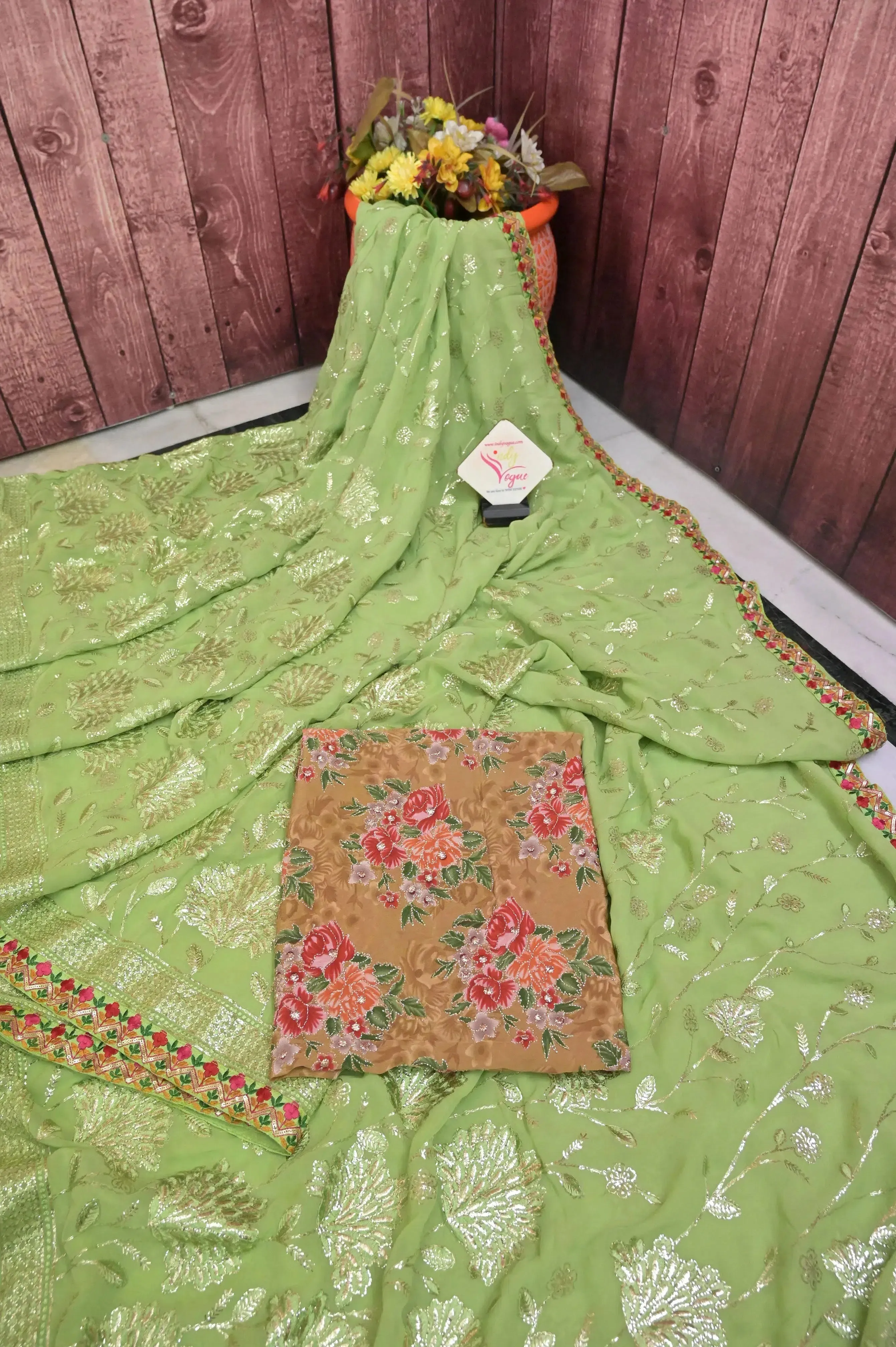 Light Green Pure Georgette Saree with Sequin Work Allover