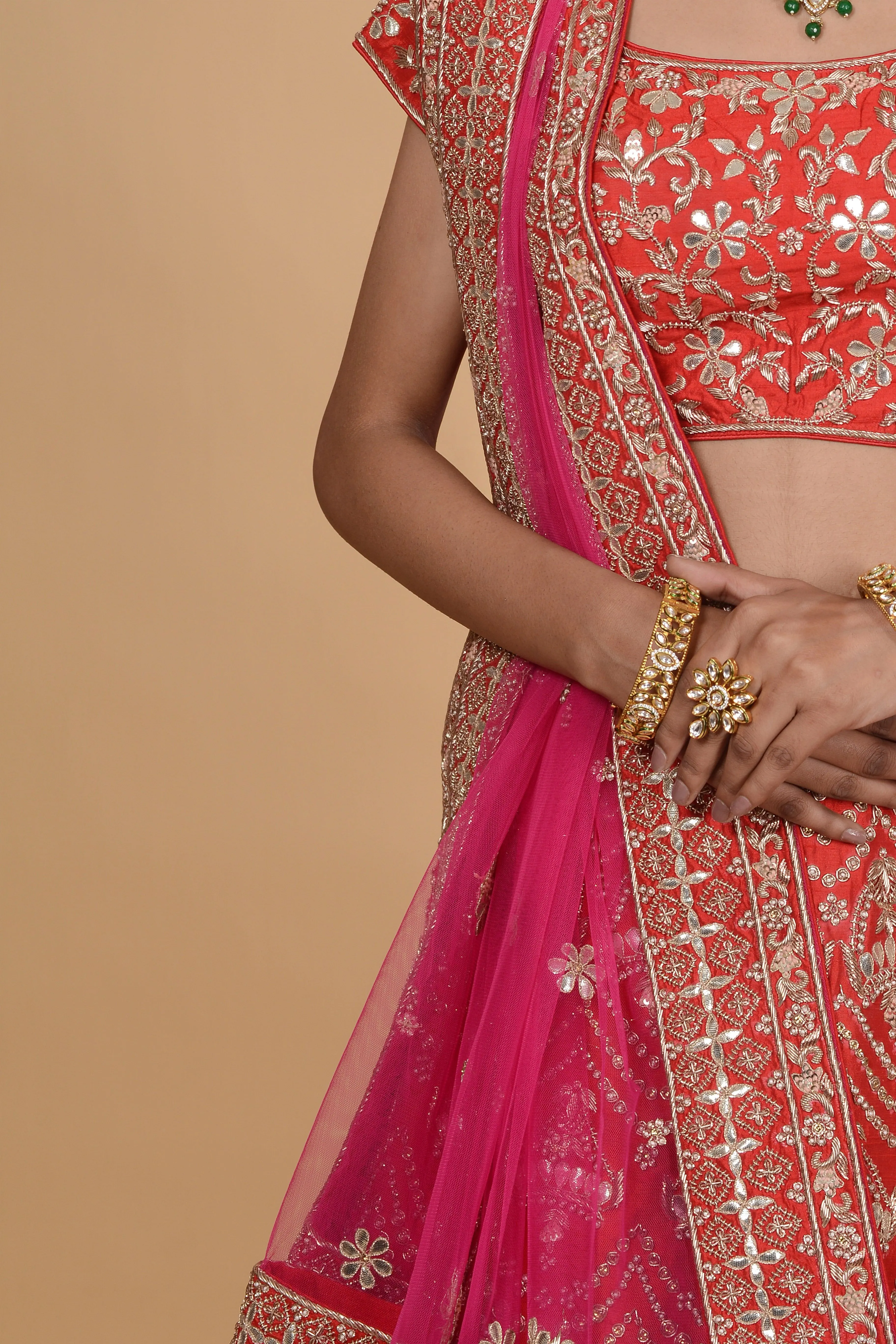 Red lehenga with pink dupatta set.